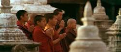 Tibetan buddhist monks prayer near Swayambunath stupa, Kathmandu, Nepal