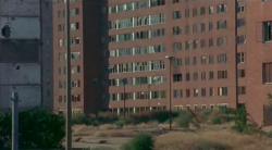 It is a photo of an abandoned Pruitt-Igoe  housing project ready to be demolished.