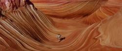 This feature is called "The Wave" and is located at Coyote Buttes North, just South of the Arizona/U
