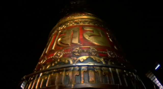 Prayer wheel, containing inside millions of rolls of prayer paper.  To be turned from right to left.  Releasing the energy in the syllables: OM MANI PADME HUM.  Usually found in Tibet, Nepal, and parts of India.