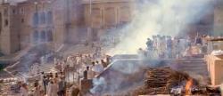 A funeral pyre on the Ganges, India